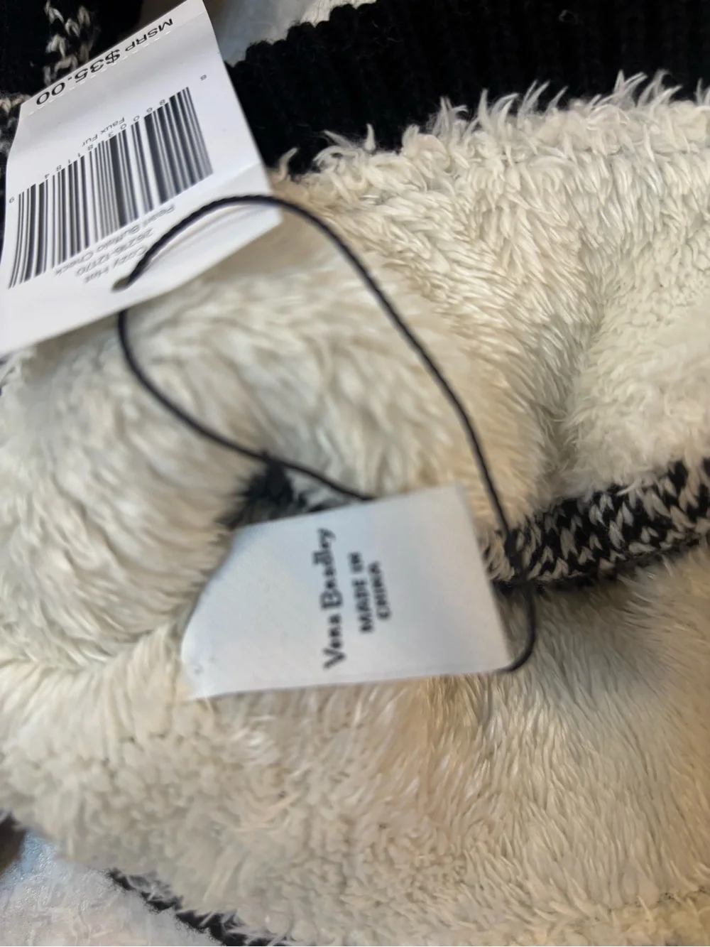 Vera Bradley Black and Pearl Fleece-Lined Knit Beanie and gloves.